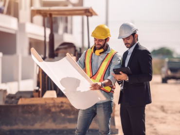 civil-engineer-construction-worker-manager-holding-digital-tablet-blueprints-talking-planing-about-construction-site-cooperation-teamwork-concept_640221-156